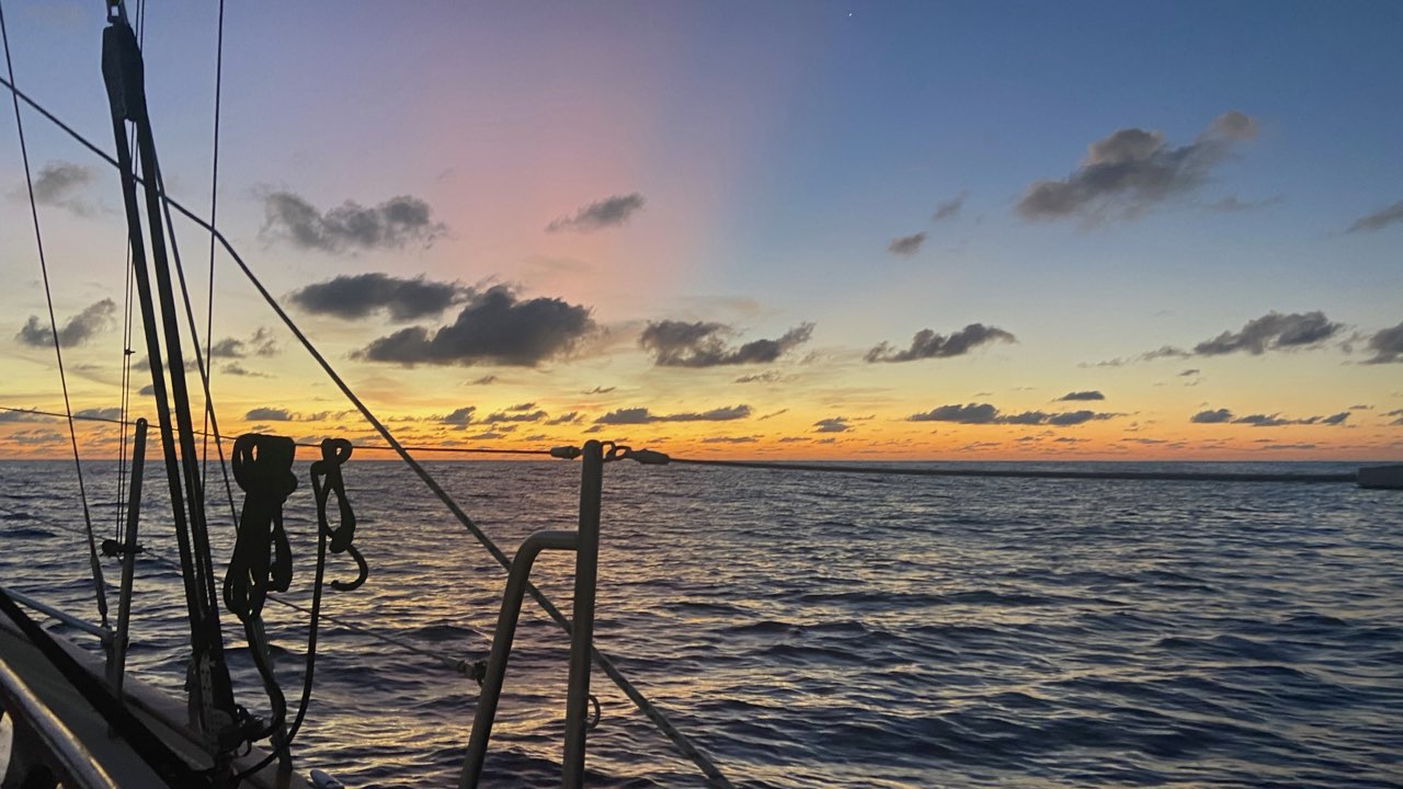 A pink-hued sunset over the Pacific