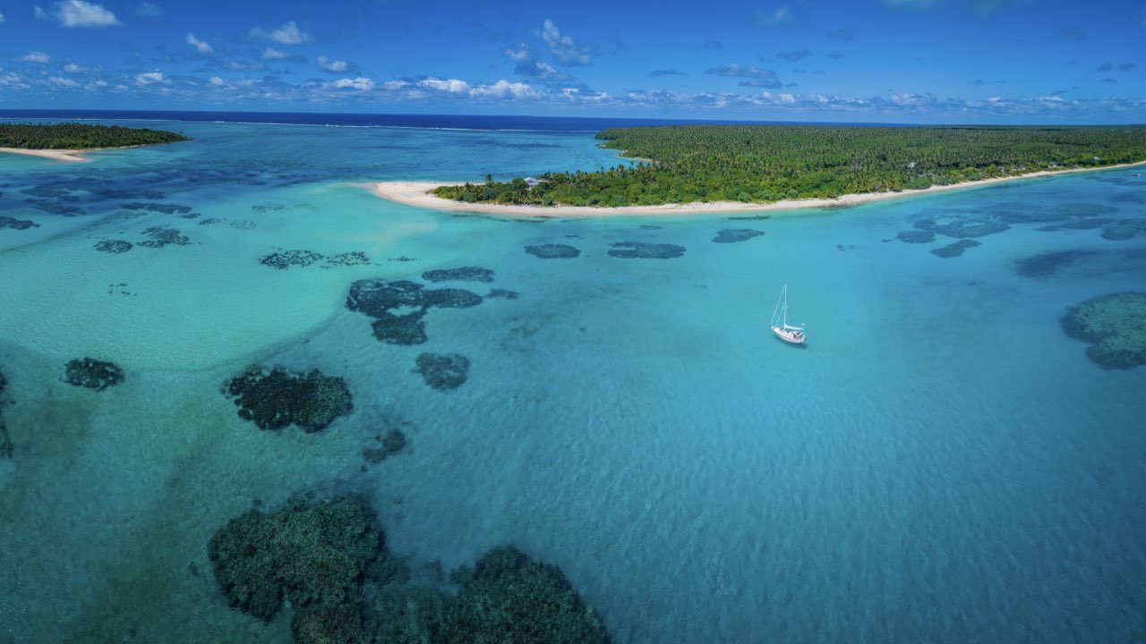 Ana Maria anchored among the reefs in Ha'apai Tonga